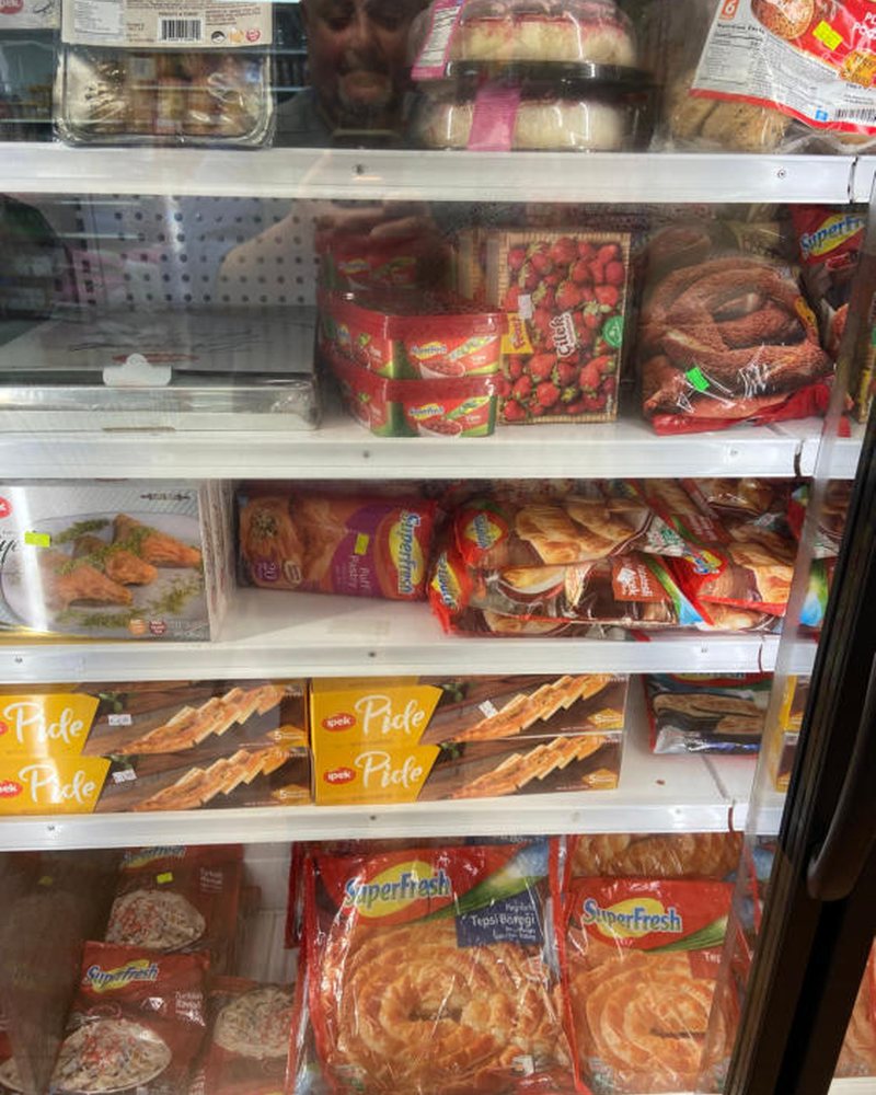 Freezer case and bread shelf in the store
